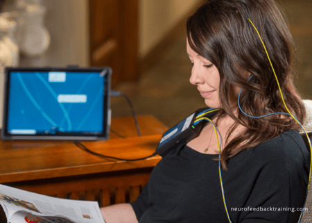 Woman with PTSD doing neurofeedback Woman with PTSD doing neurofeedback