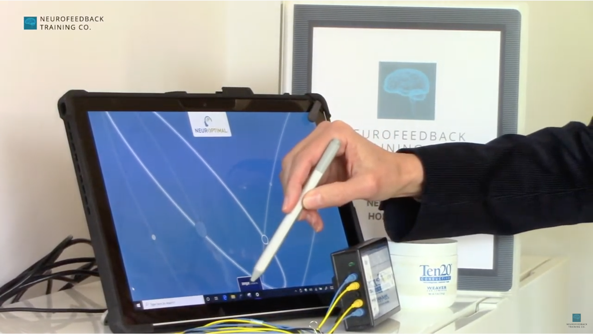 demonstrating how to use Neurofeedback system
